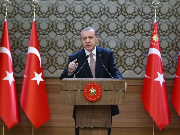 A handout picture provided by Turkish President Press office shows Turkish President Recep Tayyip Erdogan speaking during a meeting with village headmen, known as mukhtars, in Ankara, Turkey, 26 November 2015. Reports state Erdogan said Turkey has no reason to target Russia with which his country have strong relations. He also denied allegations that Turkey was buying oil from the Islamic State (IS) militants in Syria. A Russian warplane was shot down by Turkish fighter jets on 24 November as it returned from a mission in support of Syrian government forces, an incident which sparked a war of words between the two countries. EPA/TURKISH PRESIDENT PRESS OFFICE / HANDOUT
