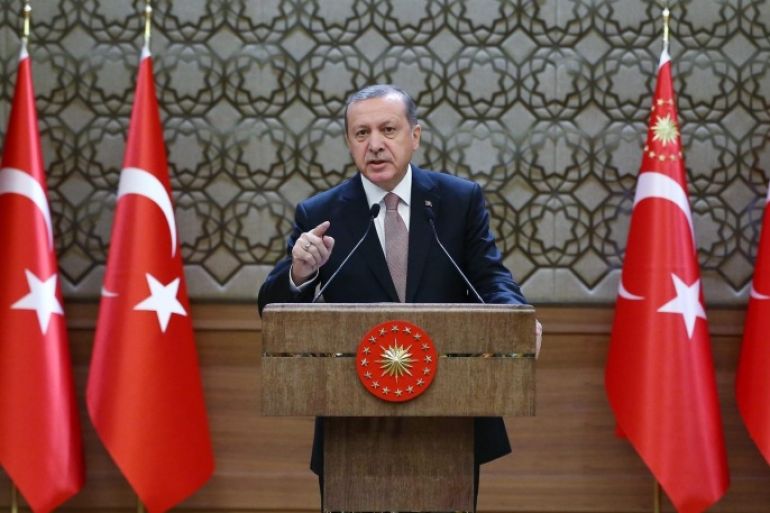 A handout picture provided by Turkish President Press office shows Turkish President Recep Tayyip Erdogan speaking during a meeting with village headmen, known as mukhtars, in Ankara, Turkey, 26 November 2015. Reports state Erdogan said Turkey has no reason to target Russia with which his country have strong relations. He also denied allegations that Turkey was buying oil from the Islamic State (IS) militants in Syria. A Russian warplane was shot down by Turkish fighter jets on 24 November as it returned from a mission in support of Syrian government forces, an incident which sparked a war of words between the two countries. EPA/TURKISH PRESIDENT PRESS OFFICE / HANDOUT