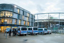 Police vehicles outside the HDI-Arena soccer stadium in Hanover, Germany, 17 November 2015. After the recent terrorist attacks in Paris, security measures have been stepped up for the international friendly soccer match between Germany and the Netherlands in Hanover on 17 November.
