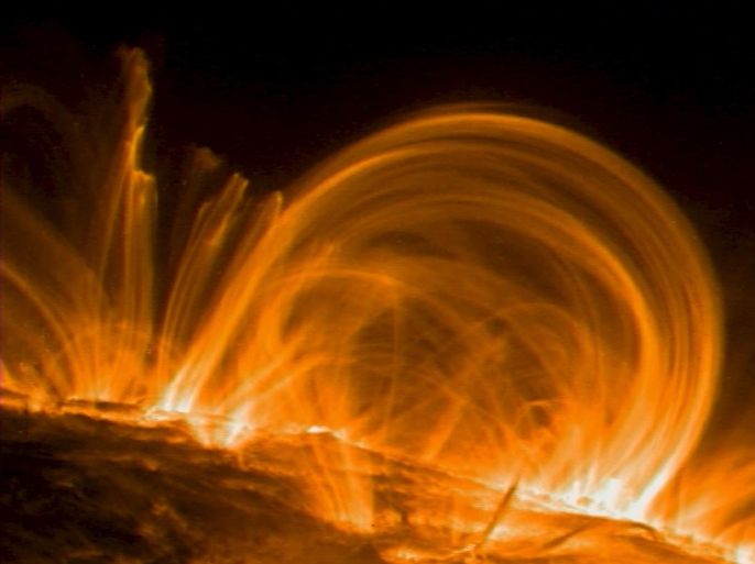 Giant fountains of fast-moving, multimillion-degree gas in the outermost atmosphere of the Sun have revealed an important clue to a long-standing mystery - the location of the heating mechanism that makes the corona about 300 times hotter than the Sun's visible surface in this September 26, 2000 file photo. REUTERS/NASA/FilesATTENTION EDITORS - THIS PICTURE IS PART OF THE PACKAGE "PSYCHEDELIC SPACE". TO FIND ALL 18 IMAGES SEARCH 'UNIVERSE IMAGERY'. ATTENTION EDITORS - THIS PICTURE WAS PROVIDED BY A THIRD PARTY. REUTERS IS UNABLE TO INDEPENDENTLY VERIFY THE AUTHENTICITY, CONTENT, LOCATION OR DATE OF THIS IMAGE. FOR EDITORIAL USE ONLY. NOT FOR SALE FOR MARKETING OR ADVERTISING CAMPAIGNS. THIS PICTURE IS DISTRIBUTED EXACTLY AS RECEIVED BY REUTERS, AS A SERVICE TO CLIENTS. TPX IMAGES OF THE DAY