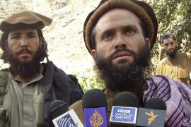 Pakistani Taliban group commander Mullah Dadullah (R), who is holding 23 teenagers hostage, speaks to the media in the Afghanistan-Pakistan border area of Kunar and Bajaur tribal region in this September 6, 2011 file photo. A NATO air strike in eastern Afghanistan has killed a commander of the Pakistani Taliban, both NATO and the Taliban said on August 25, 2012. Both sides identified the dead commander as Mullah Dadullah and said several of his comrades were also killed in the attack on Friday. REUTERS/Stringer/Files (AFGHANISTAN - Tags: CIVIL UNREST TPX IMAGES OF THE DAY POLITICS MILITARY OBITUARY PROFILE)