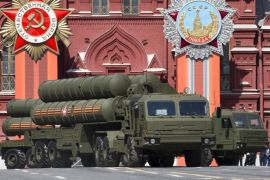 FILE - In this file photo taken on Saturday, May 9, 2015, Russian S-400 air defense missile systems drive during the Victory Parade marking the 70th anniversary of the defeat of the Nazis in World War II, in Red Square in Moscow, Russia. Russia has merged several branches of its military into the Aerospace Forces, a reorganization aimed at enhancing coordination and efficiency.(AP Photo/Alexander Zemlianichenko, file)