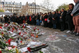 Thousands of people observe a minute of silence near the Bataclan concert venue in Paris, France, 16 November 2015. More than 130 people have been killed in a series of attacks in Paris on 13 November, according to French officials. Eight assailants were killed, seven when they detonated their explosive belts, and one when he was shot by officers, police said. French President Francois Hollande says that the attacks in Paris were an 'act of war' carried out by the Islamic State extremist group.