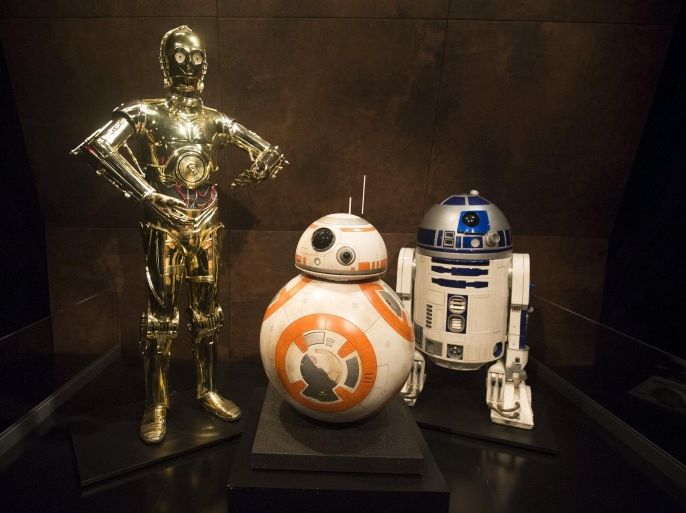 Characters C-3PO (L), BB-8 and R2-D2 (R) from Star Wars are pictured at the Discovery Store Times Square in the Manhattan borough of New York November 11, 2015. REUTERS/Carlo Allegri