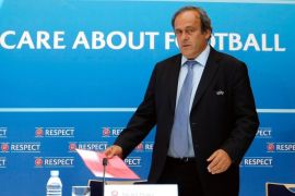 FILE - In this Aug. 28, 2015 file photo UEFA President Michel Platini arrives at a press conference after the soccer Europa League draw ceremony at the Grimaldi Forum, in Monaco. On Thursday, Oct. 8, 2015 file photo FIFA provisionally banned UEFA President Michel Platini for 90 days. (AP Photo/Claude Paris)