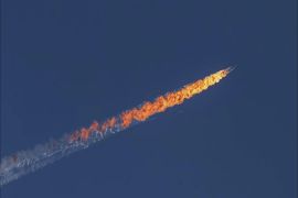 epa05039460 A still image made available on 24 November 2015 from video footage shown by the HaberTurk TV Channel shows a burning trail as a plane comes down after being shot down near the Turkish-Syrian border, over north Syria, 24 November 2015. A Russian fighter jet was shot down 24 November over the Turkish-Syrian border, the Defence Ministry in Moscow said, according to Interfax news agency. The Sukhoi Su-24 was reportedly downed by Turkish forces, Turkish state news agency Anadolu reported, citing sources in the presidency. The report said that the jet violated Turkish airspace and ignored warnings. It crashed in the north-western Syrian town of Bayirbucak, Turkish security sources were quoted as saying. EPA/HABERTURK TV CHANNEL MANDATORY CREDIT: HABERTURK TV CHANNEL