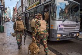REPEATING WITH CORRECT DATEBelgian soldiers board a bus during a change of shifts of patrol, in Rue Neuve, the busiest shopping street in Brussels, now empty due to the terror alert level being elevated to 4/4, in Brussels, Belgium, 22 November 2015. Belgium raised the alert status at Level 4/4 as 'serious and imminent' threat of an attack, the main effect are closing of all Metro Line in Brussels, all soccer match of league one and two cancelled countrywide. The Belgian government said it had concrete evidence of a planned terrorist attack that would have employed weapons and explosives.
