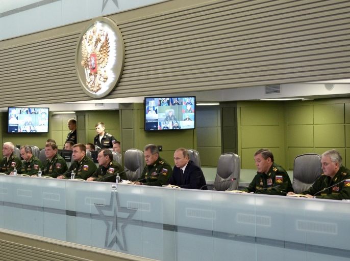 Russian President Vladimir Putin (3-R) and Defense Minister Sergei Shoigu (4-R) touring the National Defense Management Center in Moscow, Russia, 17 November 2015. Putin and Shoigu examined Russian Airspace Forces' activities in Syria. Vladimir Putin ordered his military to cooperate with France as an ally in a joint anti-terrorism operation in Syria. EPA/ALEXEY NIKOLSKIY/SPUTNIK/KREMLIN POOL MANDATORY CREDIT/SPUTNIK/