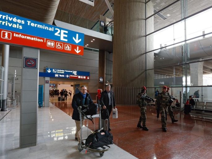 Military patrol inside the airport Charles de Gaulle in Paris, France, 14 November 2015. The French government declared a state of emergency, tightened border controls and mobilized 1,500 soldiers in consequence to the 13 November Paris attacks. At least 120 people have been killed in a series of attacks in Paris on 13 November, according to French officials. Eight assailants were killed, seven when they detonated their explosive belts, and one when he was shot by officers, police said