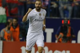 Real Madrid's Karim Benzema celebrates after scoring the opening goal against Atletico Madrid during a Spanish La Liga soccer match between Real Madrid and Atletico Madrid at the Vicente Calderon stadium in Madrid, Sunday, Oct. 4, 2015. (AP Photo/Francisco Seco)