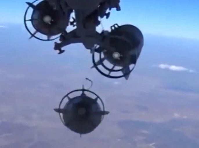 A frame grab taken from a footage from a camera under a plane, released by Russia's Defence Ministry, November 17, 2015, shows a Russian military jet dropping bombs at an unknown location in Syria. Russia said on Tuesday it had stepped up air strikes against Islamist militants in Syria with long-range bombers and cruise missiles after the Kremlin said it wanted retribution for those responsible for blowing up a Russian airliner over Egypt. REUTERS/Ministry of Defence of the Russian Federation/Handout via Reuters ATTENTION EDITORS - THIS PICTURE WAS PROVIDED BY A THIRD PARTY. REUTERS IS UNABLE TO INDEPENDENTLY VERIFY THE AUTHENTICITY, CONTENT, LOCATION OR DATE OF THIS IMAGE. EDITORIAL USE ONLY. NOT FOR SALE FOR MARKETING OR ADVERTISING CAMPAIGNS. NO RESALES. NO ARCHIVE. THIS PICTURE IS DISTRIBUTED EXACTLY AS RECEIVED BY REUTERS, AS A SERVICE TO CLIENTS.
