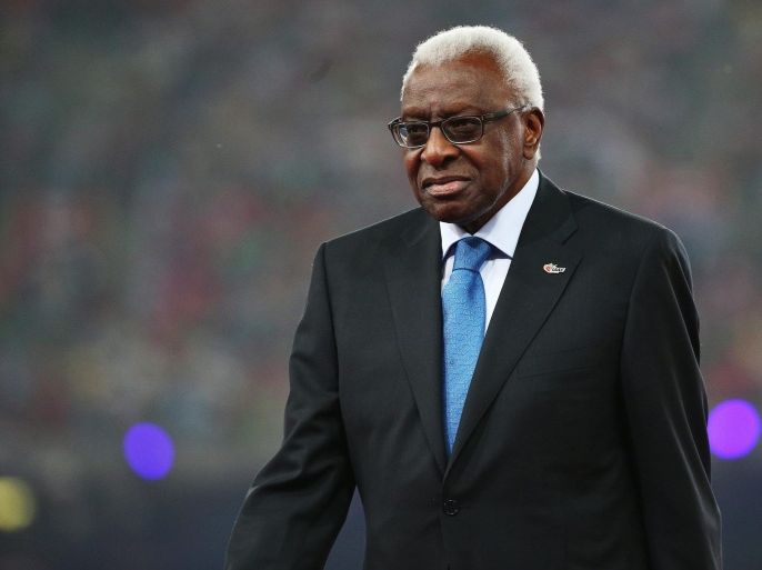 (FILE) A file photo dated 30 August 2015 showing then outgoing IAAF President Lamine Diack at the closing ceremony of the Beijing 2015 IAAF World Championships at the National Stadium, also known as Bird's Nest, in Beijing, China. Media reports on 04 November 2015 state Lamine Diack has been arrested in Paris as part of investigations to alleged corruption linked with cover up of doping cases. Diack and his advisor and lawyer Habib Cisse who also was charged, were both released on bail.