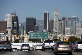 The downtown Los Angeles skyline is seen with a clear sky from the 110 freeway in Los Angeles, California, United States, November 12, 2015. El Nino storms brought summer rain which led to less smog in the city this year than last, according to the South Coast Air Quality Management District. REUTERS/Lucy Nicholson