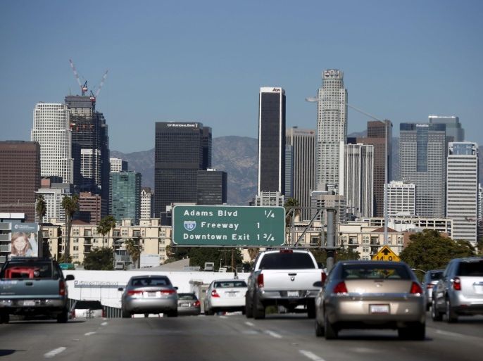 The downtown Los Angeles skyline is seen with a clear sky from the 110 freeway in Los Angeles, California, United States, November 12, 2015. El Nino storms brought summer rain which led to less smog in the city this year than last, according to the South Coast Air Quality Management District. REUTERS/Lucy Nicholson