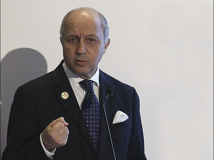 France's Foreign Minister Laurent Fabius gestures as he talks during a news conference at the end of the G-20 summit in Antalya, Turkey, Monday, Nov. 16, 2015. The leaders of the Group of 20 wrapped up their two-day summit near the Turkish Mediterranean coastal city of Antalya Monday against the backdrop of heavy French bombardment of the Islamic State's stronghold in Syria. The bombings marked a significant escalation of France's role in the fight against the extremist group. (Anadolu Agency via AP, Pool)