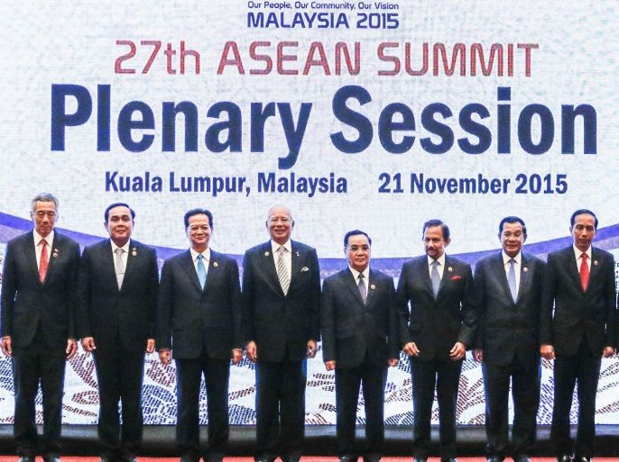 ASEAN leaders (L-R) Philippines President Benigno Aquino III, Singapore Prime Minister Lee Hsien Loong, Thailand Prime Minister Prayut Chan-o-cha, Vietnam Prime Minister Nguyen Tan Dung, Malaysia Prime Minister Najib Razak, Laos Prime Minister Thongsing Thammavong, Brunei Sultan Hassanal Bolkiah, Cambodia Prime Minister Hun Sen, Indonesia President Joko Widodo and Myanmar President Thein Sein pose for a group photo during the 27th ASEAN summit in Kuala Lumpur, Malaysia, 21 November 2015. Malaysia is hosting the 27th ASEAN Summit, a meeting between ASEAN member countries and its three dialogue partners, as well as a meeting of the East Asia Summit (EAS) forum.