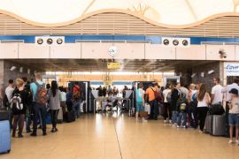 Tourists line up for luggage screening at the airport of Sharm el-Sheikh, Egypt, on Saturday, Nov. 7, 2015. London approved the resumption of British flights to Sinai starting Friday and planned a wave of flights to retrieve its stranded nationals, but it banned passengers from checking luggage on the flights. Instead, any checked-in bags were to be brought later on cargo planes. (AP Photo/Vinciane Jacquet)