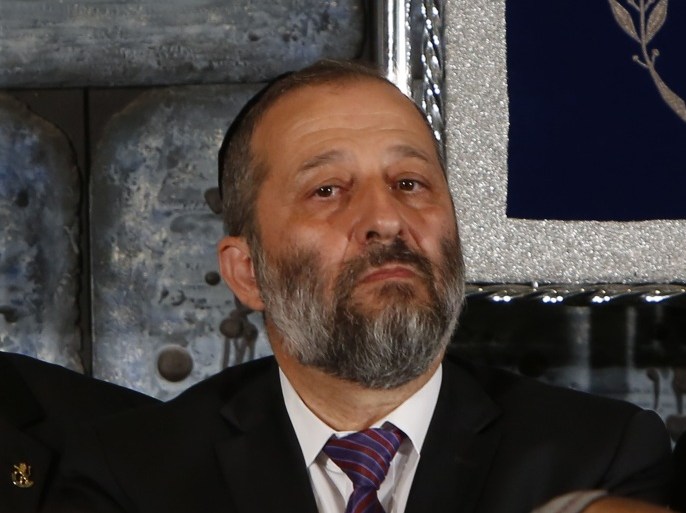file picture taken on May 19, 2015, shows Israeli Minister of Economy Aryeh Deri looking on during the traditional photograph in honor of the swearing in of the 34th government of Israel at the Presidential compound in Jerusalem. Deri resigned on November 1, opening the way for the government to greenlight a multibillion dollar gas deal with US energy giant Noble Energy, a statement from the Prime Minister's office said. AFP PHOTO/GALI TIBBON