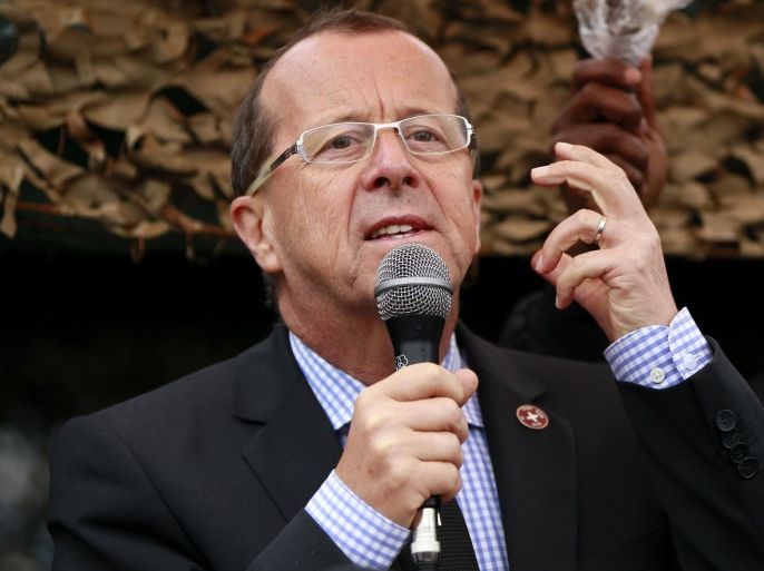 U.N. special envoy to Congo, Martin Kobler, addresses troops during a special parade for their slain colleague Major Hatim Shaban from Tanzania killed in an operation with the Congolese army to drive back M23 rebels in Munigi outside Goma in the eastern Democratic Republic of Congo, August 31, 2013. The U.N. peacekeeper from Tanzania was killed and three others were wounded on Wednesday in an operation with the Congolese army to drive back M23 rebels. A 3,000-strong U.N. intervention brigade, with a tough new mandate to protect civilians and neutralise armed groups in the mineral-rich central African nation, sprang into action last week after the United Nations accused the rebels of shelling the city. REUTERS/Thomas Mukoya (DEMOCRATIC REPUBLIC OF CONGO - Tags: SOCIETY CIVIL UNREST CRIME LAW OBITUARY)