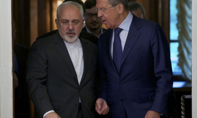 Russian Foreign Minister Sergey Lavrov, right, welcomes his Iranian counterpart Mohammad Javad Zarif during their meeting in Moscow, Russia, Monday, Aug. 17, 2015. The two are holding talks expected to focus on the implementation of the nuclear deal between Tehran and world powers, as well as international efforts to mediate the conflict in Syria. (AP Photo/Ivan Sekretarev)
