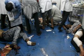 ATTENTION EDITORS - VISUAL COVERAGE OF SCENES OF INJURY OR DEATH  People lie on the floor of a hospital after they were injured by a shell that landed in a residential area during fighting between Houthi militants and pro-government militants in Yemen's southwestern city of Taiz September 24, 2015. REUTERS/Stringer