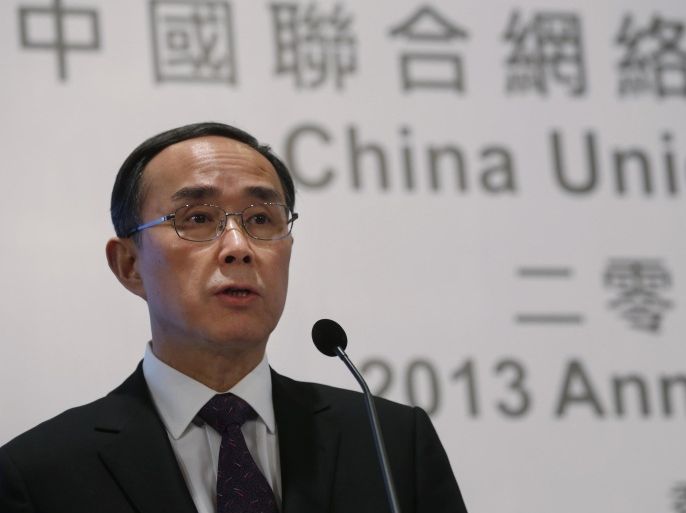 China Unicom Ltd. Chairman and Chief Executive Officer Chang Xiaobing speaks at a press conference to announce the company's 2013 earnings in Hong Kong Thursday, Feb. 27, 2014. China Unicom posted on Thursday net profit last year rose 47%. (AP Photo/Kin Cheung)