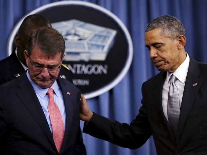 U.S. President Barack Obama leaves with U.S. Defense Secretary Ash Carter (L) after delivering a statement on the counter-Islamic State campaign at the Pentagon in Washington, December 14, 2015. REUTERS/Carlos Barria