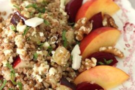 This July 13, 2015 photo shows kasha salad with beets, stone fruit, walnuts and mint in Concord, N.H. Kasha, the toasted form of buckwheat, cooks up in about 10 minutes. (AP Photo/Matthew Mead)