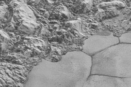Blocks of Pluto's water-ice crust appear jammed together in the informally named al-Idrisi mountains in this high-resolution image from NASA's New Horizons spacecraft released December 4, 2015. REUTERS/NASA/JHUAPL/SwRI/Handout via Reuters THIS IMAGE HAS BEEN SUPPLIED BY A THIRD PARTY. IT IS DISTRIBUTED, EXACTLY AS RECEIVED BY REUTERS, AS A SERVICE TO CLIENTS. FOR EDITORIAL USE ONLY. NOT FOR SALE FOR MARKETING OR ADVERTISING CAMPAIGNS