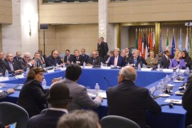 US Secretary of State John Kerry, background centre, takes part in an international conference on Libya at the Ministry of Foreign Affairs, in Rome, Sunday, Dec. 13, 2015. Diplomats from the United States, Europe and the Mideast met Sunday with leaders of Libya's rival political factions to impress upon them the need to adopt a U.N.-brokered national unity plan aimed at rescuing the country from chaos and preventing Islamic State extremists from gaining more ground. (Mandel Ngan/Pool Photo via AP)
