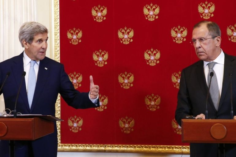 US Secretary of State, John Kerry, left, and Russia's Foreign Minister, Sergey Lavrov, address a joint press conference at the Kremlin, Tuesday, Dec. 15, 2015 in Moscow. Earlier, in talks with Russian Foreign Minister Sergey Lavrov, Kerry said the world benefits when great powers agree in their approaches to major crises. (Sergei Karpukhin/Pool Photo via AP)