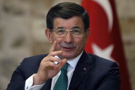 Turkish Prime Minister Ahmet Davutoglu speaks to a group of foreign reporters in Istanbul, Turkey, Wednesday, Dec. 9, 2015. Davutoglu has accused Russia of attempting "ethnic cleansing" through its air campaign in northern Syria. Davutoglu said that Russia’s operations have targeted Turkmen and Sunni communities around the Latakia region and Russia’s action could force “many more millions” of people to flee. (AP Photo/Emrah Gurel)