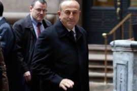 Turkey's Foreign Minister Mevlut Cavusoglu arrives for a meeting of the International Syria Support Group at a hotel in New York, Friday, Dec. 18, 2015. Nations meeting Friday in New York and the U.N. will essentially be negotiating a Russian plan for a "political transition," based on the Syrian government's consent and with no clear reference to President Bashar Assad's departure. (AP Photo/Richard Drew)