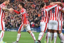JR600 - Stoke on Trent, Staffordshire, UNITED KINGDOM : Stoke City's Spanish striker Bojan Krkic (2nd L) celebrates with Stoke City's Austrian striker Marko Arnautovic (L) and teammates after scoring the opening goal during the English Premier League football match between Stoke City and Manchester United at the Britannia Stadium in Stoke-on-Trent, central England on December 26, 2015. AFP PHOTO / PAUL ELLIS