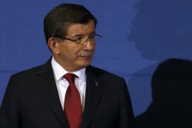 Turkish Prime Minister Ahmet Davutoglu attends a press conference after a meeting with his Serbian counterpart Aleksandar Vucic in Belgrade, Serbia, Monday, Dec. 28, 2015. During his two-day visit to Serbia, Davutoglu is expected to discuss the bilateral political, economic and commercial ties with Serbian top officials. (AP Photo/Darko Vojinovic)