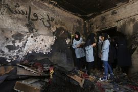 Palestinian girls visit the home of teacher Riham Dawabsha during her funeral at Douma village near the West Bank city of Nablus, 07 September 2015. Riham succumbed to her wounds late 06 September more than five weeks after she suffered third degree burns affecting about 90 per cent of her body following a settler attack on her family home in Douma. Her 18-month old son Ali was killed in the attack, while her husband, Saad, succumbed to his wounds a week later. Her four-year-old son Ahmad survived.