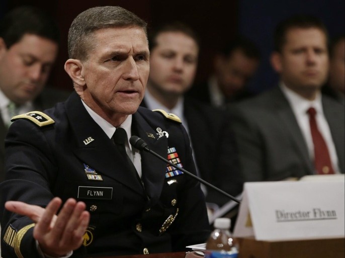 Defense Intelligence Agency director U.S. Army Lt. General Michael Flynn testifies before the House Intelligence Committee on "Worldwide Threats" in Washington February 4, 2014. REUTERS/Gary Cameron (UNITED STATES - Tags: CRIME LAW POLITICS MILITARY)