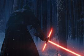 This photo provided by Disney shows, Adam Driver as Kylo Ren with his Lightsaber in a scene from the new film, "Star Wars: The Force Awakens." "Star Wars" isn't just strong. It's unstoppable. The revival of the nearly 40-year-old space saga has already dominated the box office and toy shelves. Now, it's also been selected as The Associated Press Entertainer of the Year and is amassing support for Academy Awards consideration. (Film Frame/Disney/Copyright Lucasfilm 2015 via AP)