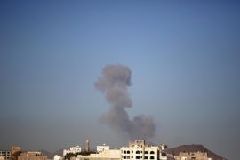 Smoke rises after a Saudi-led airstrike hits an army base in Sanaa, Yemen, Saturday, Dec. 5, 2015. (AP Photo/Hani Mohammed)