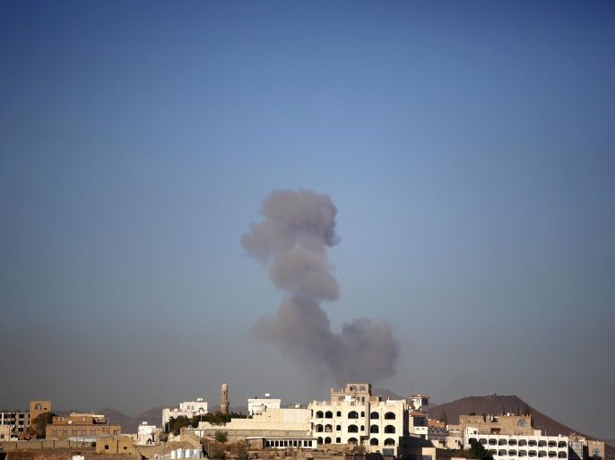 Smoke rises after a Saudi-led airstrike hits an army base in Sanaa, Yemen, Saturday, Dec. 5, 2015. (AP Photo/Hani Mohammed)