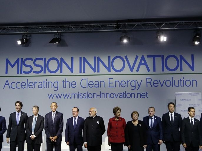 World leader including French President Francis Hollande, 9th left, and U.S President Barack Obama, 8th left, pose during the 'Mission Innovation: Accelerating the Clean Energy Revolution' meeting at the COP2, United Nations Climate Change Conference, in Le Bourget, north of Paris, Monday, Nov. 30 2015. (Ian Langsdon, Pool photo via AP)