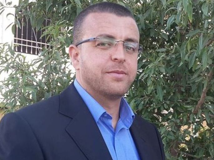 الصحفي محمد القيق المعتقل بسجون الاحتلال الجزيرة رام الله ديسمبر 2015