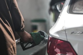 In this Wednesday, Sept. 16, 2015 photo, a car fills up at a gas station in Jiddah, Saudi Arabia. In Jiddah, drivers are fueling up their cars at just 45 cents a gallon, four times less than the price of water. (AP Photo/Mosa'ab Elshamy)