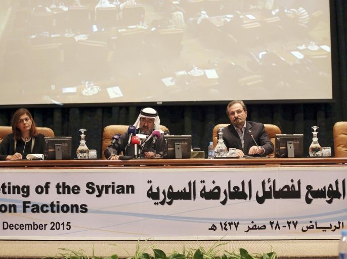 In this Thursday, Dec, 10, 2015 photo Abdulaziz bin Saqr, center, Chairman of the Gulf Research Council, speaks as Louay Safi, right, spokesperson for the Syrian National Coalition, and Hind Kabawat, left, a member of the elected committee that will negotiate with the Syrian regime, listen during a press conference after a three-day meeting of Syrian opposition groups in Riyadh, Saudi Arabia. Saudi Arabia is hosting a three-day meeting in Riyadh to try to unite the Syrian opposition before potential talks with the government of President Bashar al-Assad. (AP Photo/Khalid Mohammed)