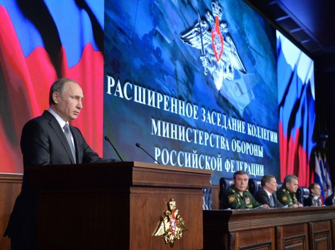 MOW4997 - Moscow, -, RUSSIAN FEDERATION : Russian President Vladimir Putin gives a speech at an expanded session of the Defence Ministry Board at the National Defence Control Centre in Moscow on December 11, 2015. President Vladimir Putin on December 11 ordered his top military brass to respond firmly to threats in Syria, speaking two weeks after Turkey shot down a Russian warplane in the war-torn country. AFP PHOTO / SPUTNIK / ALEXEI DRUZHININ