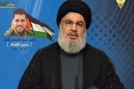 DK25 - -, -, LEBANON : An image grab taken from Hezbollah's al-Manar TV on December 27, 2015, shows Hassan Nasrallah, the head of Lebanon's militant Shiite Muslim movement Hezbollah, giving a televised address from an undisclosed location in Lebanon on the one-week anniversary of the killing of Samir Kantar (portrait-L), one of the party's top militants, in a suspected Israeli air strike in Damascus. AFP PHOTO / HO / AL-MANAR === RESTRICTED TO EDITORIAL USE - MANDATORY CREDIT "AFP PHOTO / HO / AL-MANAR" - NO MARKETING NO ADVERTISING CAMPAIGNS - DISTRIBUTED AS A SERVICE TO CLIENTS ===