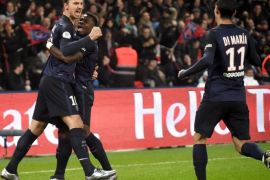 Paris Saint Germain player Zlatan Ibrahimovic celebrates with Serge Aurier and Angel di Maria after his goal during the French soccer Ligue 1 match between Paris Saint Germain (PSG) and Olympique Lyonnais (OL) at the Parc des Princes stadium in Paris, France, 13 December 2015.