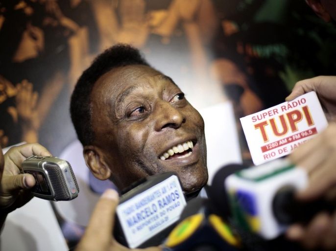 Legendary Brazilian soccer player Pele speaks to journalists during an exhibition on the country's past World Cup participations entitled "Brazil, a country, a world" at the Ulysses Guimaraes Convention Center in Brasilia December 17, 2013. The exhibition will be opened to the public from December 18 to January 19, 2014, before touring the other host cities of the 2014 World Cup. REUTERS/Ueslei Marcelino (BRAZIL - Tags: HEADSHOT SPORT SOCCER WORLD CUP)