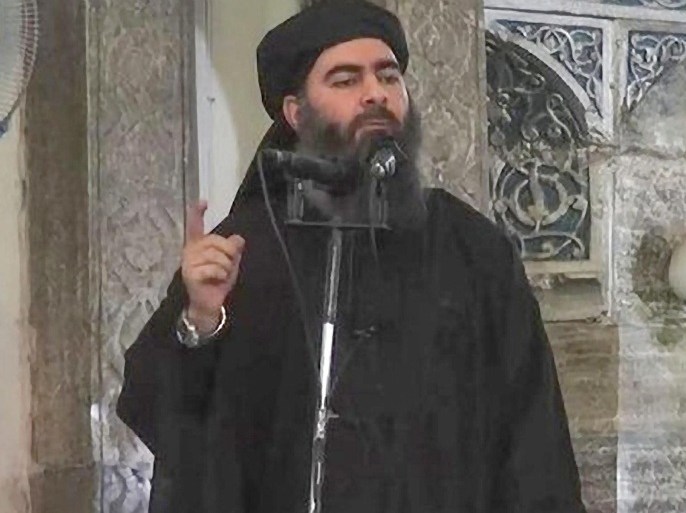 (FILE) A file frame from video released by the Islamic State (IS) purportedly shows the caliph of the self-proclaimed Islamic State, Abu Bakr al-Baghdadi, giving a speech in an unknown location. News reports said on 08 November 2014 airstrikes took place by the US on a gathering of Islamic State commanders near Mosul. The strikes destroyed a convoy of 10 armed trucks, Colonel Patrick Ryder, a spokesman for Central Command, reported. But Ryder could not confirm whether Islamic State leader Abu Bakr al-Baghdadi was among those present in the convoy. EPA/ISLAMIC STATE VIDEO / HANDOUT *** Local Caption *** 51550521