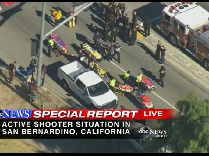 This still video image from a helicopter, courtesy of KABC TV in Los Angeles shows a shooting scene in San Bernardino, California on December 2, 2015. Police were hunting Wednesday for one or more gunmen who opened fire inside a building in San Bernardino in California, with reports of 20 victims.Heavily armed SWAT teams, firefighters and ambulances swarmed the scene, located about an hour east of Los Angeles, as police warned residents away. "San Bernardino Fire Department units responding to reports of 20 victim shooting incident in 1300 block of S. Waterman. SBPD is working to clear the scene," the city fire department said on Twitter. AFP PHOTO/KABC TV/HANDOUT = RESTRICTED TO EDITORIAL USE - MANDATORY CREDIT "AFP PHOTO / KABC TV" - NO MARKETING NO ADVERTISING CAMPAIGNS - DISTRIBUTED AS A SERVICE TO CLIENTS = NO A LA CARTE SALES